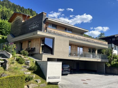 Alpendorf Apartment | Appartement Schwarz