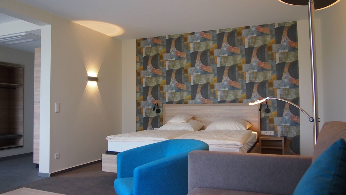 Bramsche Apartment | Appartement mit Südbalkon, Klimaanlage und Schwimmbad + Sauna im Haus