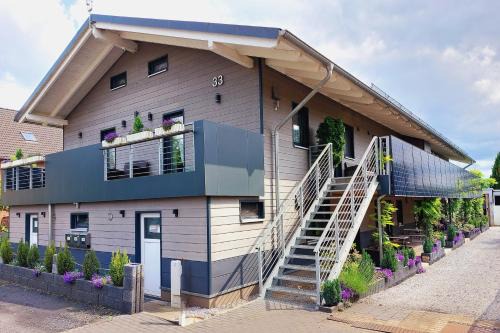 Luenen Apartment | APPARTEMENTHAUS "AM KORNFELD" - 10 Apartments, 40 Betten, Raucher-Balkon, Waschraum, Garten, Grillplatz, Tischtennis, Parkplatz