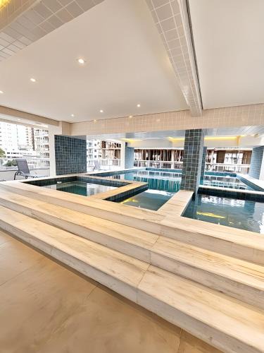 Caicara Apartment | Apto com lazer completo, piscina, ar, mercadinho e pet friendly a 1 min da praia