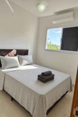 Santa Monica Apartment | Apto prox Madrecor, Ufu, Parque Sabia c Ar condicionado, Garagem