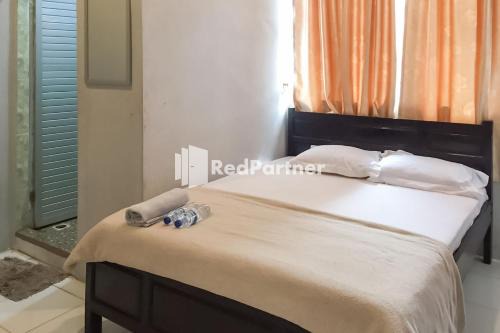 Balige Hotel | Aquino Marito Homestay Mitra RedDoorz
