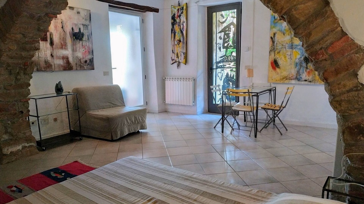 Scarlino Apartment | Artist's House Plus, sea view garden and original artwork.