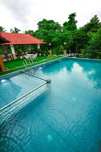 Athirapally Hotel | Athirappilly Rainland Resort