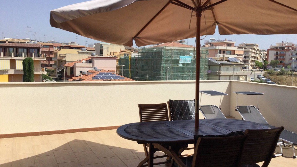 Pozzallo Apartment | Attic, stylishly furnished, large terrace and sea view, 5 min. to the beach.