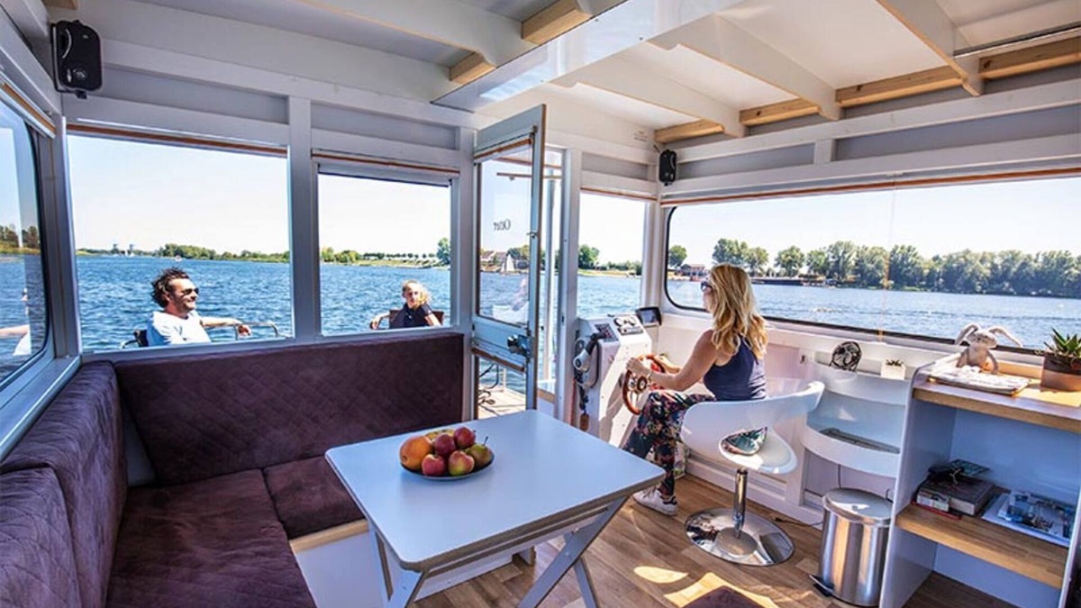 Ophoven Boat Rental | Attractive houseboat in Kinrooi with terrace