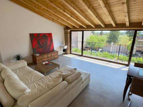 Bornato House | B&Bike la vetrata sui vigneti