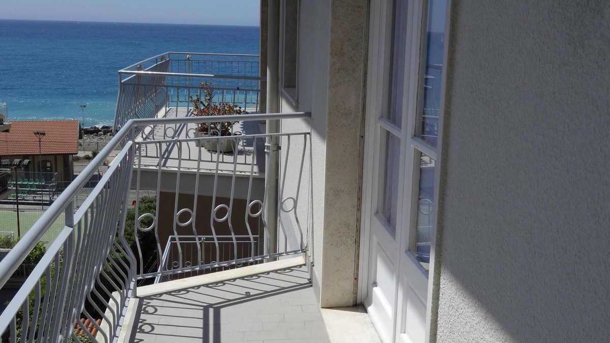 Ospedaletti Apartment | Balcony of the Moro, with vistamare. Close to beach, bars and shops. 5 positiletto.