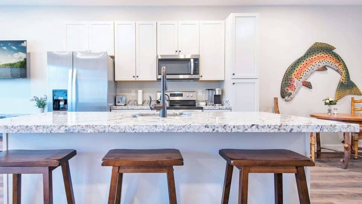 Swan Valley Condo | Basecamp Stays: Mtn Views, Patio, & South Fork Fun