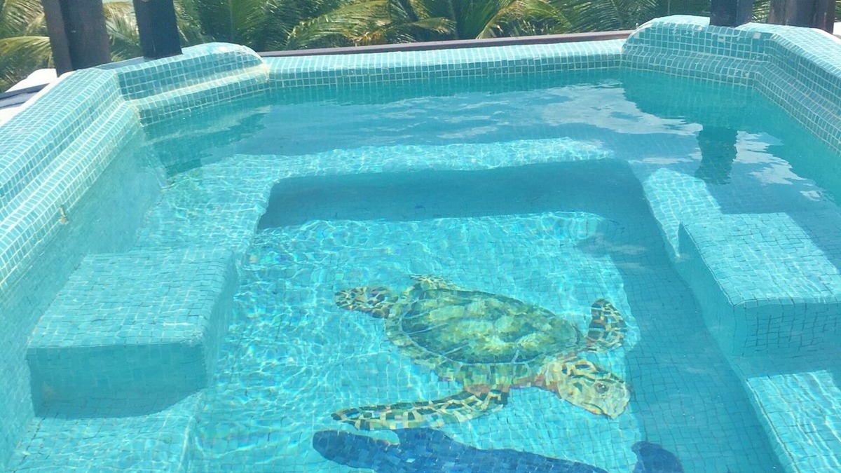 Puerto Bravo Villa | Beach front twin home - central courtyard - great for families and large groups