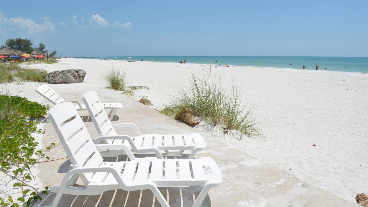 Bradenton Beach Condo | Beach House 1 Beach Front Panoramic Sunset Views Screened Lanai