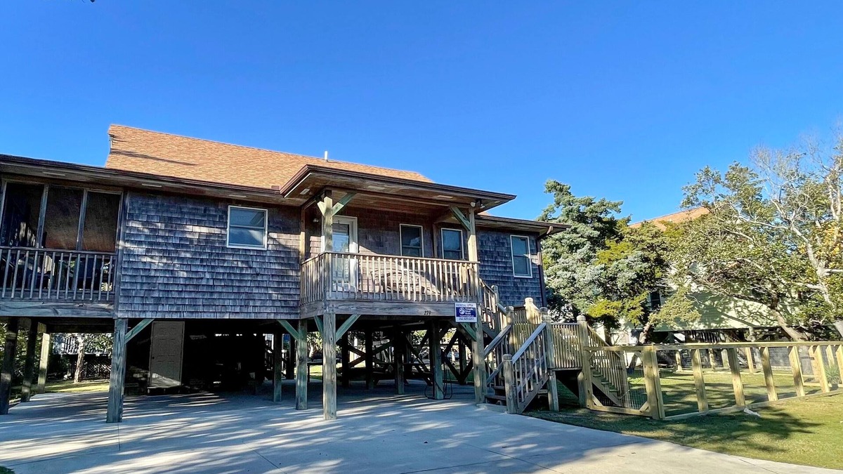 Ocracoke House | Beach Therapy: Dog friendly, spacious interior and screened porches.
