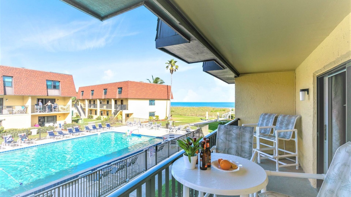 Avon By The Sea Condo | 🌴Beachfront Family Retreat: Pool, Private Balcony & Walk to the Pier