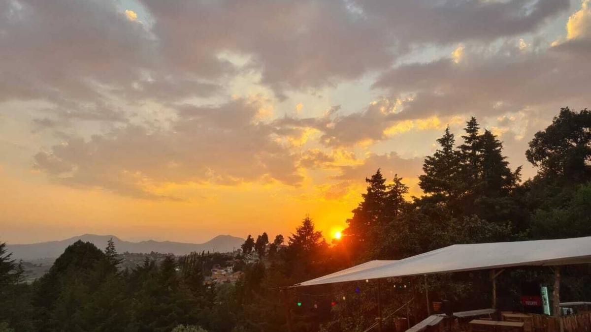 Jiquipilco RV Rental | beautiful glamping with a double bed in the forest