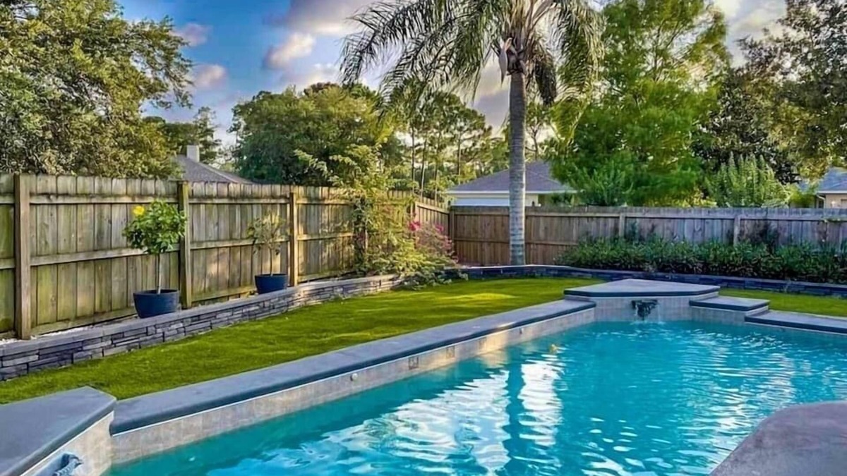 Titusville House | Beautiful heated pool home with office in Florida