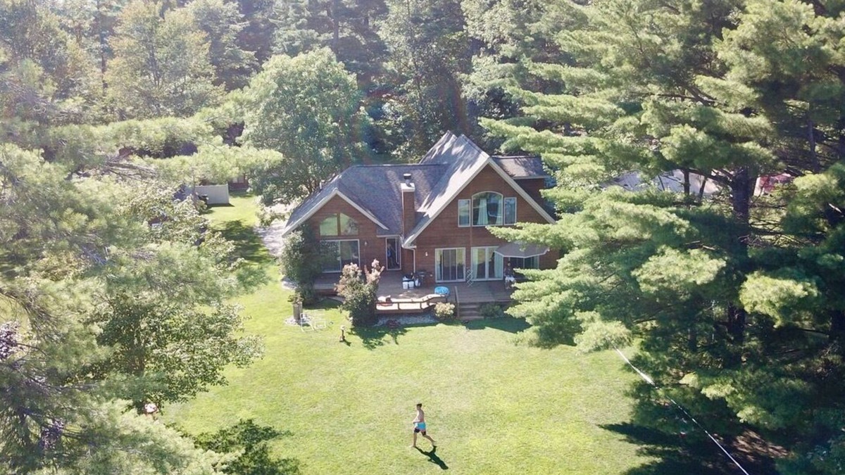 Gaylord House | Beautiful lakeside home with private beach, access to golf, skiing, shopping.
