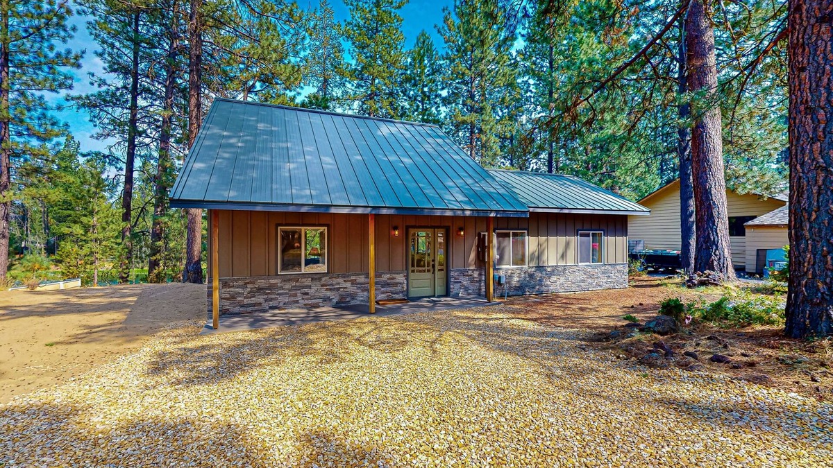 Three Rivers House | Beautiful riverfront home with private dock, fireplace, WiFi, and patio