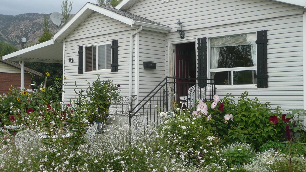 Brigham City House | Beautiful small Garden Surrounding This Little Home. Clean and Comfortable.