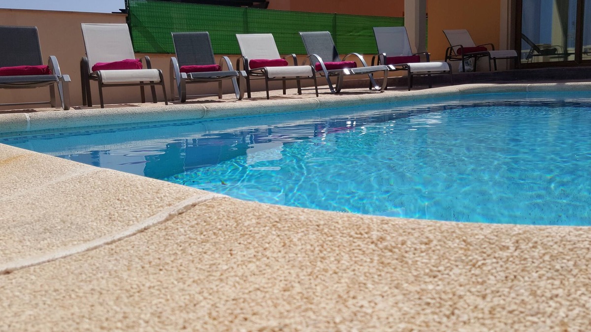 Caleta de Fuste Villa | Beautiful, spacious villa, heated pool, sleeps eight, with quality furnishings