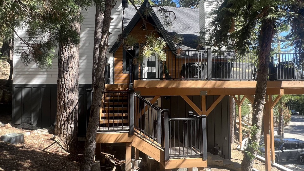 Blue Jay Cabin | Beautiful updated 3 level home with high ceilings, a wall of windows & game room