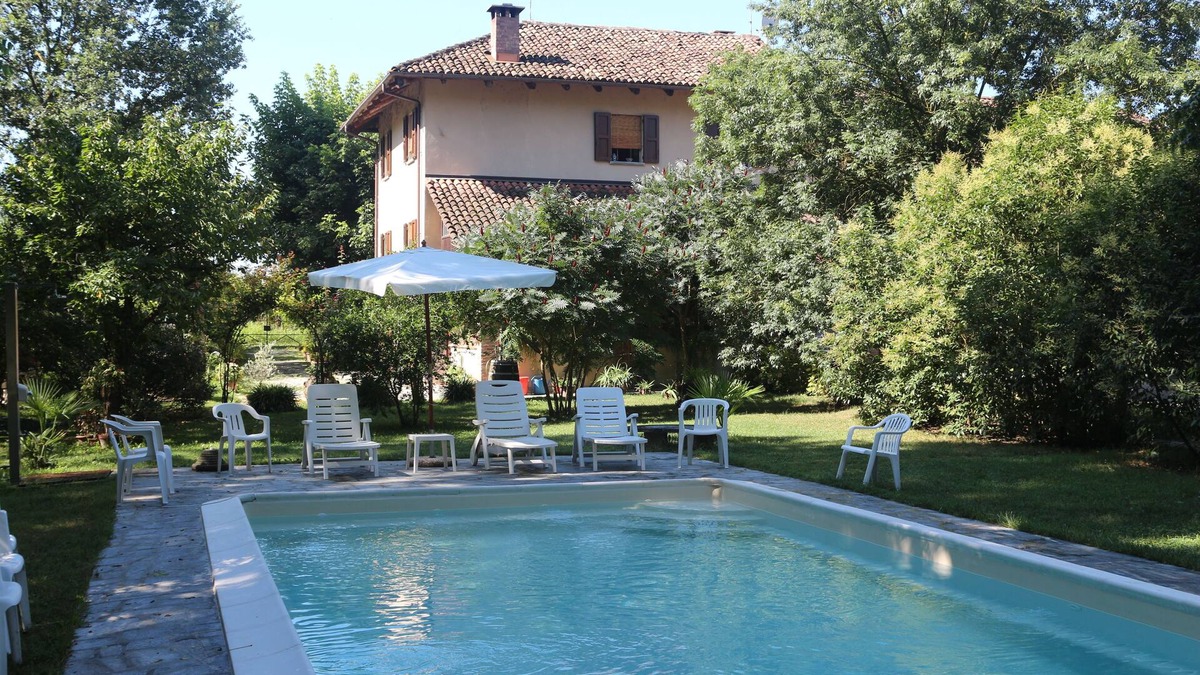 Cornale House | Beautifully restored farmhouse with pool immersed in the greenery