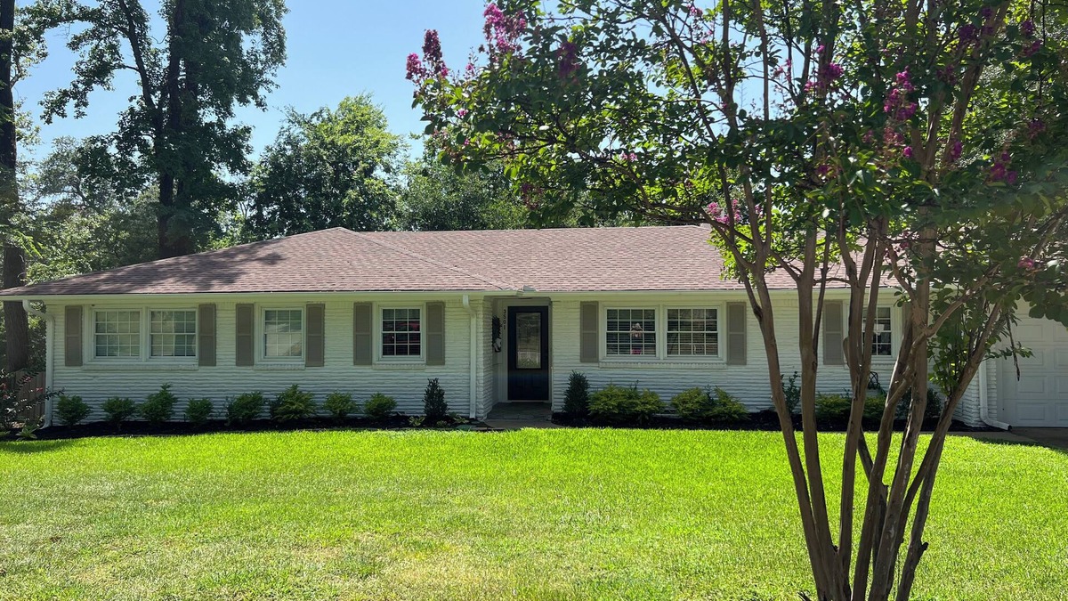Tyler House | Beautifully updated 3bedroom 2 bath home with a large glassed in sunroom.