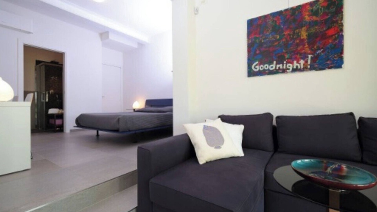 Palazzolo dello Stella Bed & Breakfast | Bed and Breakfast Loggia degli Artisti 'Deluxe Room Two' with Shared Pool and Air Conditioning