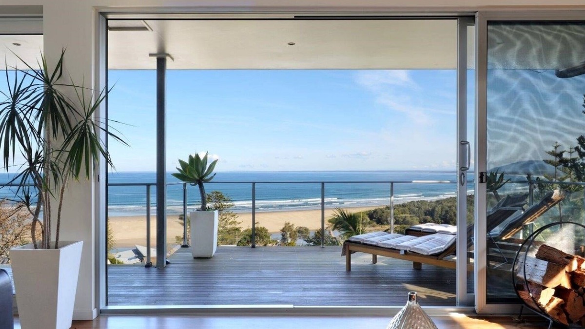Gerroa House | BLUE SALT-Spectacular water views. Wood Burner Fire. Outdoor living on deck.