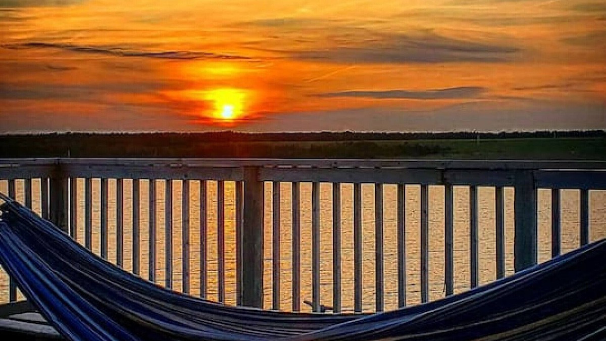 Cheticamp Apartment | Boat house on the sea.