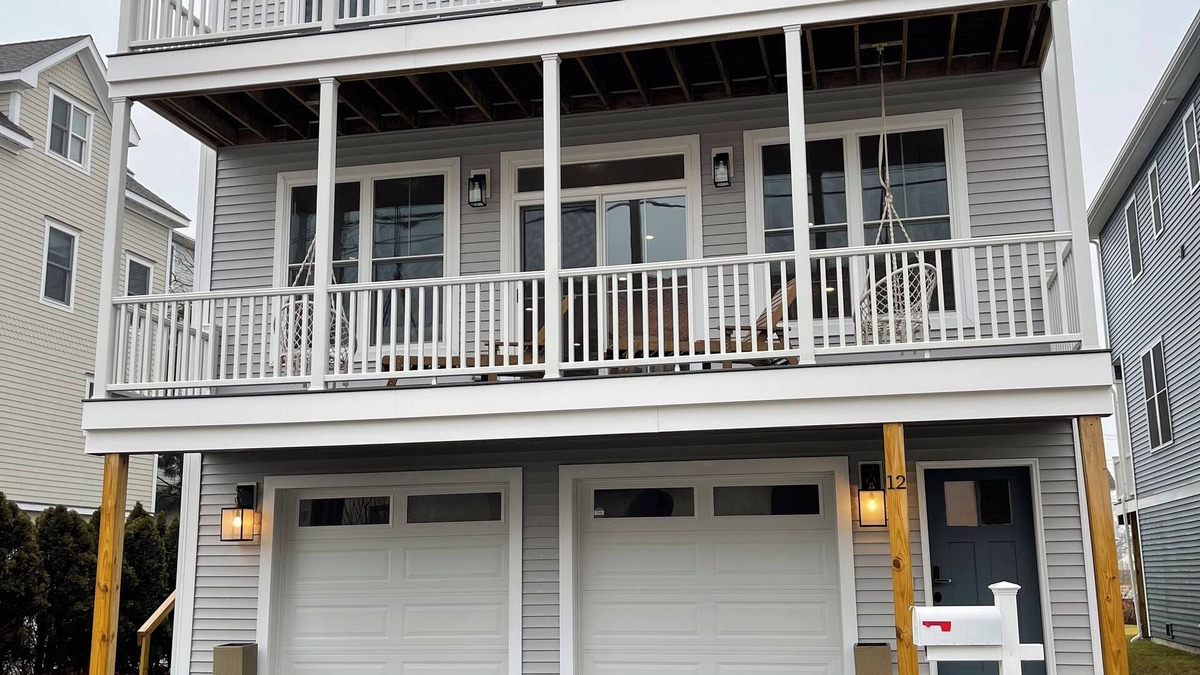 Devon House | Brand new house with water views just steps from beach!