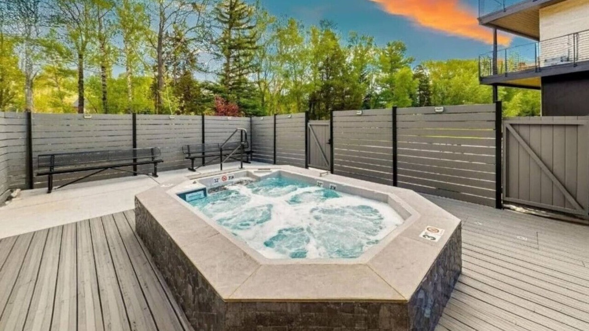Willow Grove Condo | Brand new property with hot tub, fire pit, parking, covered ski storage, and more!