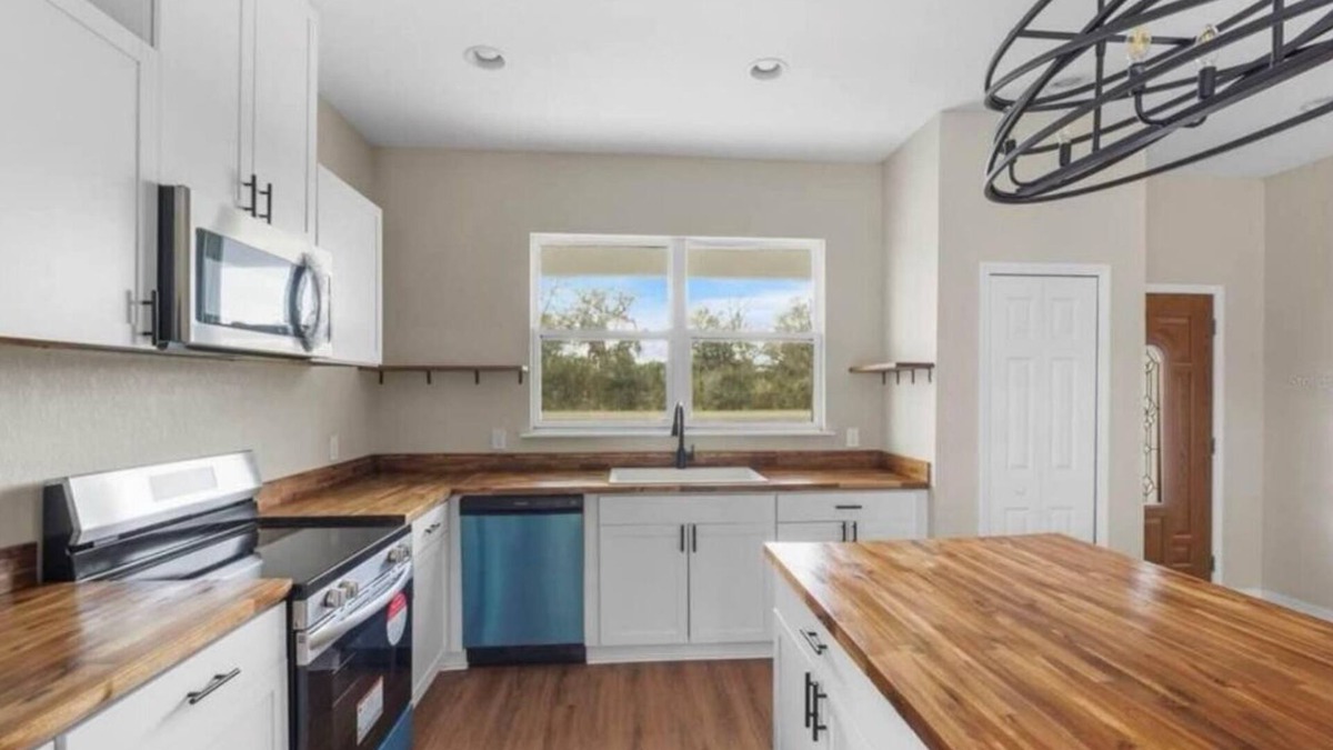 Nalcrest House | Brand New Spring Fed Lake Front Home