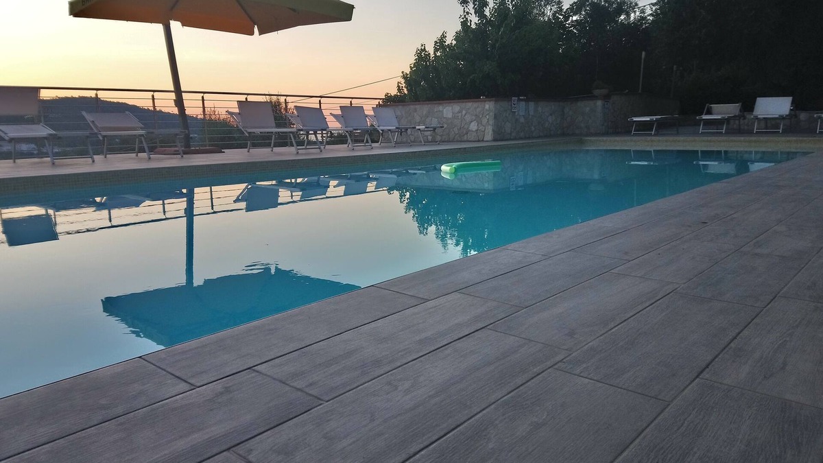Peschici House | Brand new three-room apartment with veranda, pool and climate