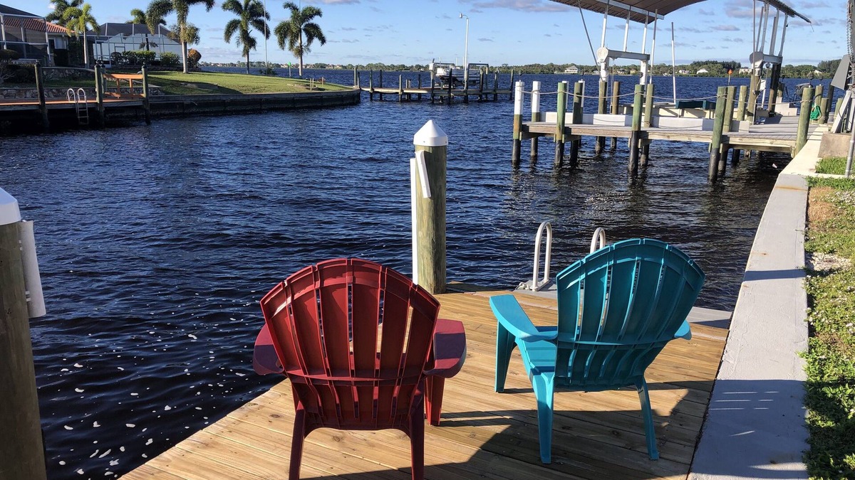 Gulf Cove House | Breath taking canal, pool home with golf access. 15 minutes from beaches.