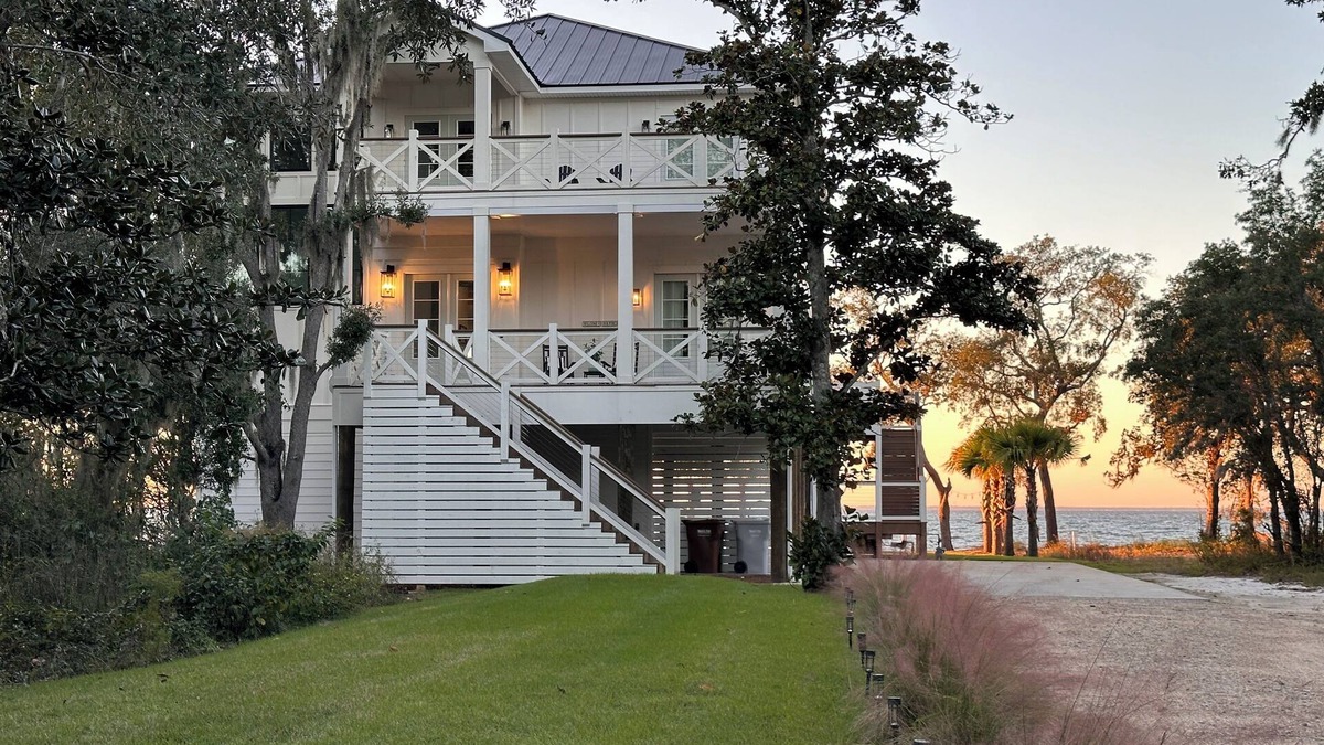 Gulf Breeze House | BREATHTAKING Waterfront Home with private dock and sunset vistas sleeps up to 24