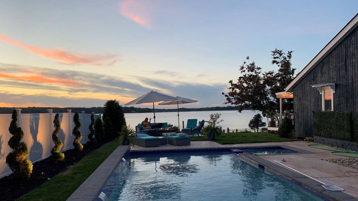 Elkton House | Breathtaking waterfront property with pool, private dock and open floor plan.