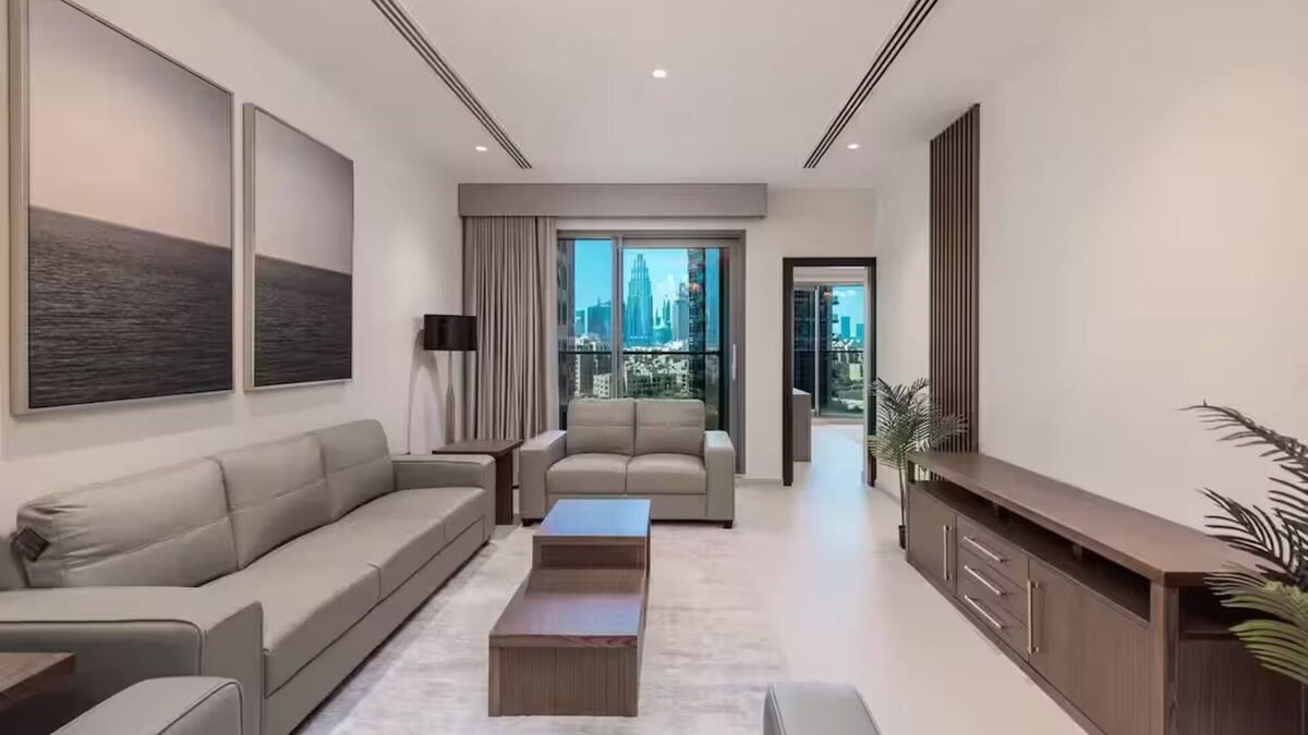 Dubai Sports City Apartment | Burj Khalifa 3BR-Prime Location
