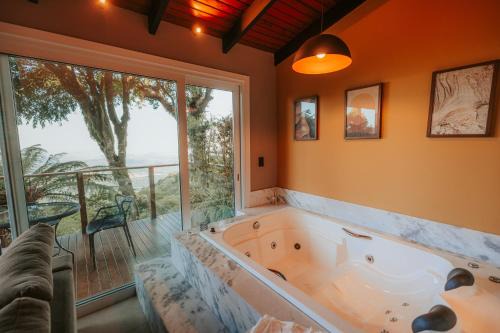 Igrejinha House | Cabana romântica com Jacuzzi ao lado de Gramado