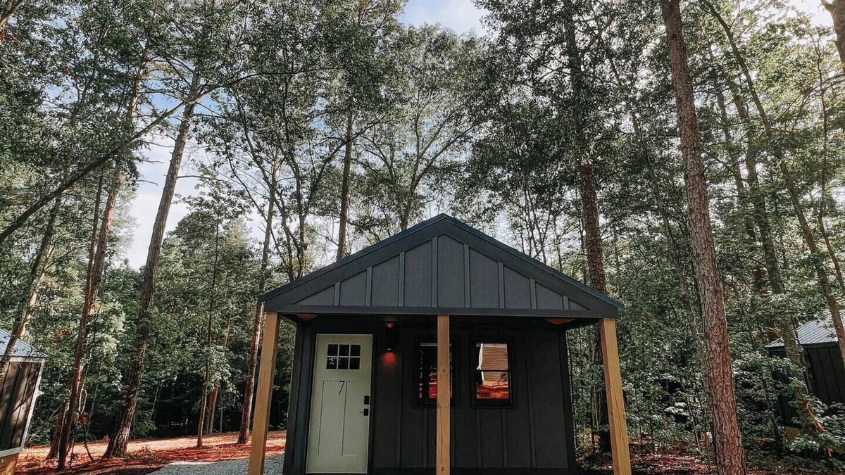 Hartwell RV Rental | Cabin #7: One king-size bed, a kitchenette, and a large gravel parking pad beside the cabin for easy boat or trailer storage.