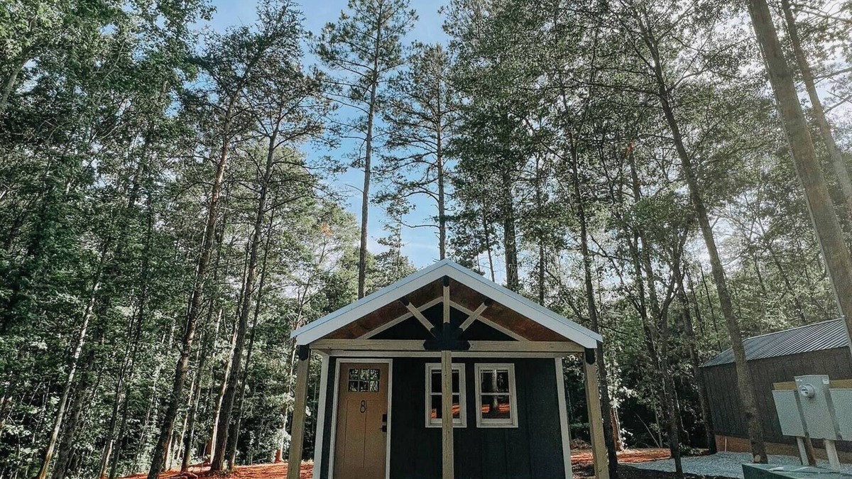 Hartwell RV Rental | Cabin #8: Studio style layout with kitchenette and a large gravel parking pad beside the cabin for easy boat or trailer storage.