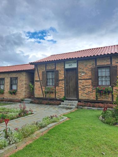 Sao Bonifacio House | Caminhos da Serra do Tabuleiro - Casa Centenária Enxaimel 1915