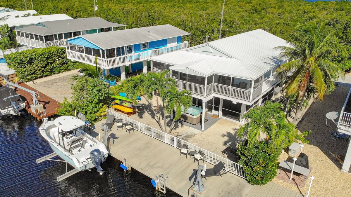 Key Largo House | Canal-front home with private dock, hot tub, water views, kayaks, & deck