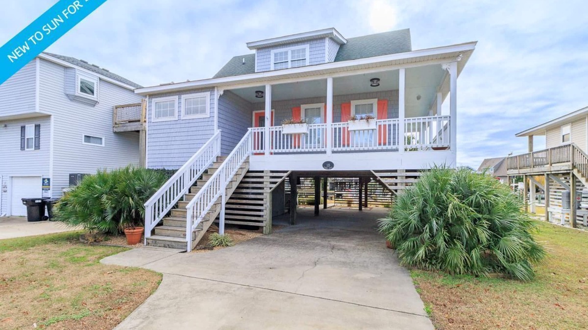 Colington Harbour House | Canalfront home w/wraparound decks and community amenities!