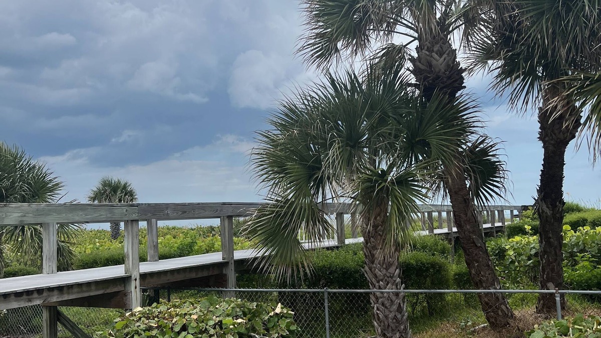 Port Canaveral Condo | Cape Canaveral Oceanside Oasis - 1st floor with bikes and beach toys