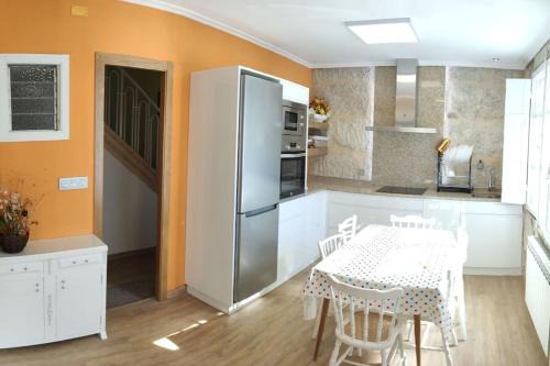 O Irixo House | Casa Carmiña: Casa para pequeños grupos en el corazón de Galicia