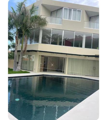 Crucecita House | Casa cascada candela