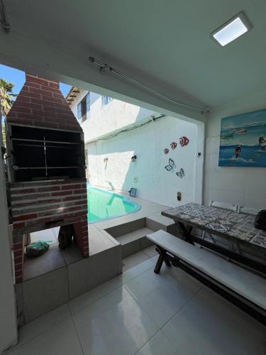 Ossos Apartment | Casa com piscina a 70 metros do mar