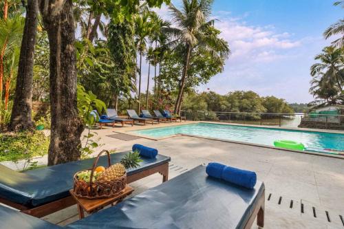 Saipem Villa | Casa Saipem with River View & Kitchen access by StayVista