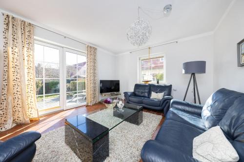 Hohe Dune Apartment | CBlue "Ferienhaus am Yachthafen - Strandläufer"