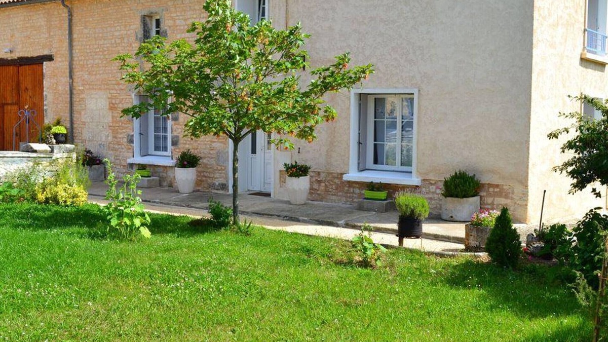 Saint-Angeau Cottage | Charming 19th-Century Farmhouse: Fireplace, Garden, Bikes, Baby Gear & More in Tranquil Setting